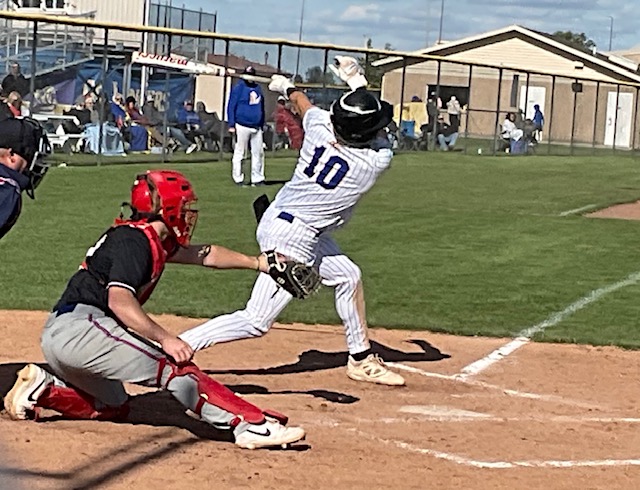 Lincolnview’s Gavin Evans fouls off a pitch against Crestview Friday. The Crestview catcher is Zaine Cereghin. (CherryRoad Media/Jim Cox).