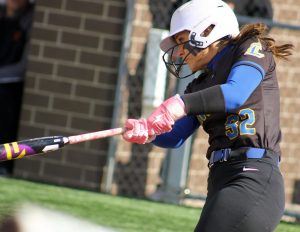 Lincolnview junior #32 Lainey Spear sends a single into left field to lead off the fourth inning during Friday’s 4-3 district final loss to Minster. (CherryRoad Media/Brandon Unverferth)
