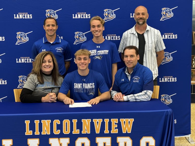 Pictured with Kreston are his parents, Kris and Brent; his brother, Karter; University of Saint Francis coach Brendan Moody and Lincolnview head coach Matt Langdon. (Photo Submitted)