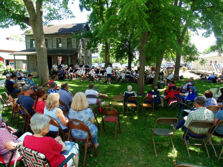 The Van Wert Area Community Concert Band performed on the grounds of the historical society as part of the “Holiday at Home” celebration on July 4. (Sam Shriver/CherryRoad Media)