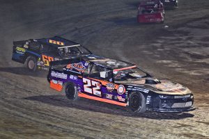 Tony Anderson (22) and Todd Sherman (60) race for the lead during the closing laps of the Thunderstock feature. (Photo Submitted)