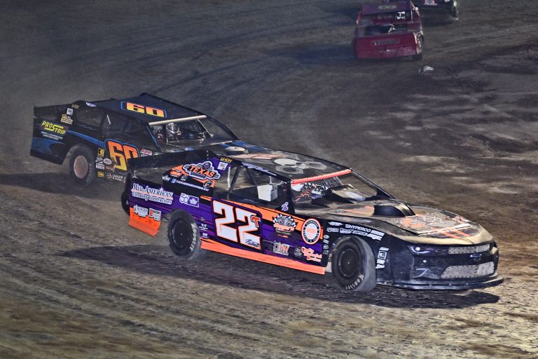 Tony Anderson (22) and Todd Sherman (60) race for the lead during the closing laps of the Thunderstock feature. (Photo Submitted)