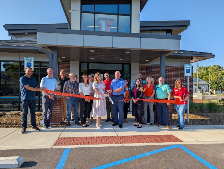 Stephanie Phillips and Brian Renner cut the ribbon to officially open the north branch of First Federal Van Wert. (Sam Shriver/CherryRoad Media)