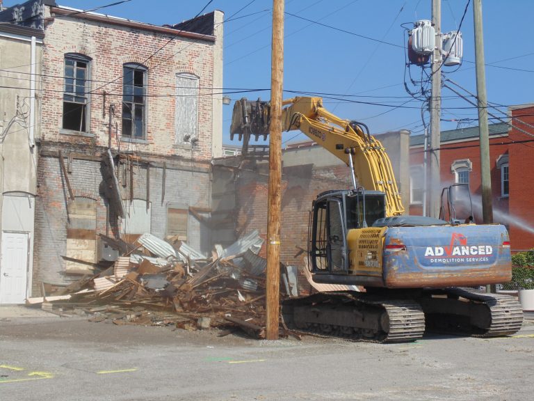 Demolition began Monday morning at 114 S. Washington St. (Sam Shriver/CherryRoad Media)