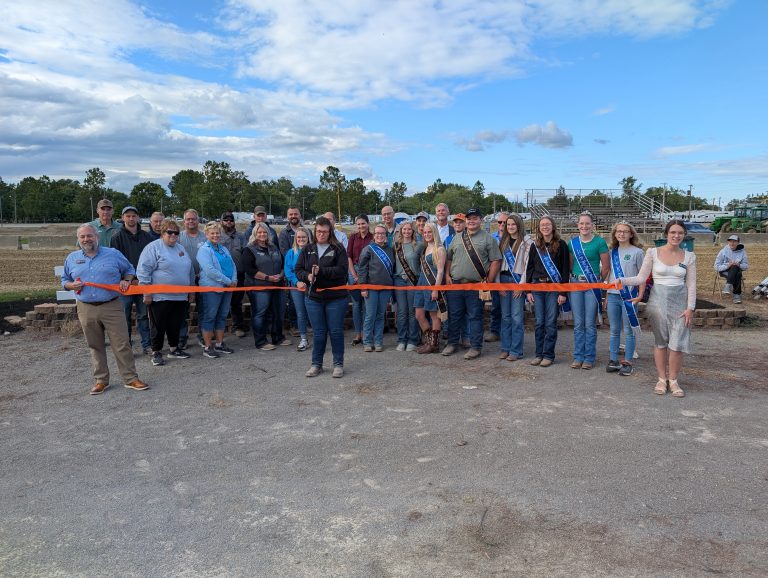 Fair Board President Stephanie Boroff cuts the ribbon during opening ceremonies at the 169th Van Wert County Fair. (Sam Shriver/CherryRoad Media)