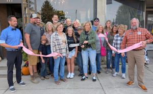 Halie Harting cut the ribbon on Harting Homesteader’s new storefront on West Tully Street in Convoy. (Sam Shriver/CherryRoad Media)